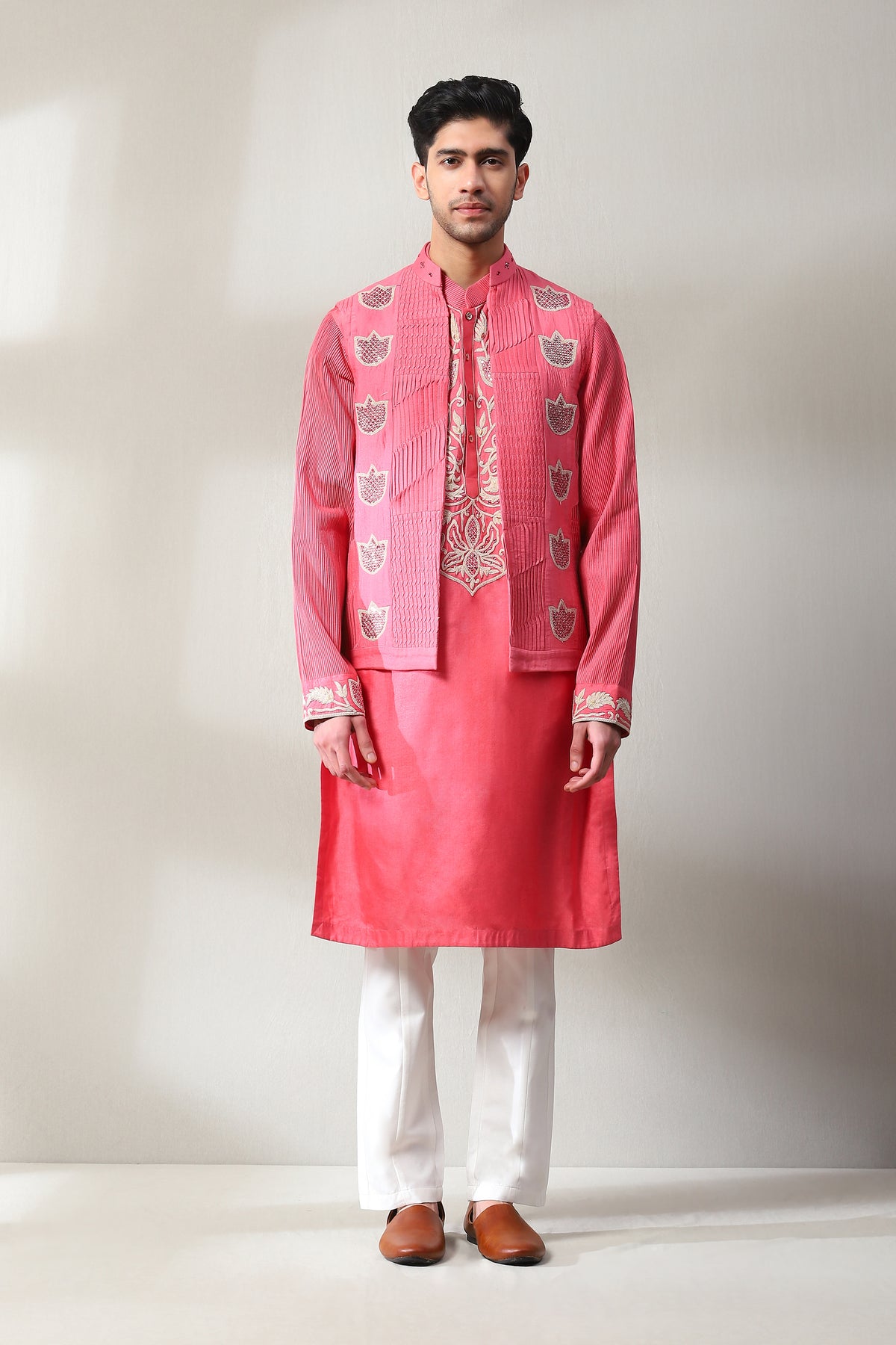 This pleted handspun dark pink jacket with off white slim pants