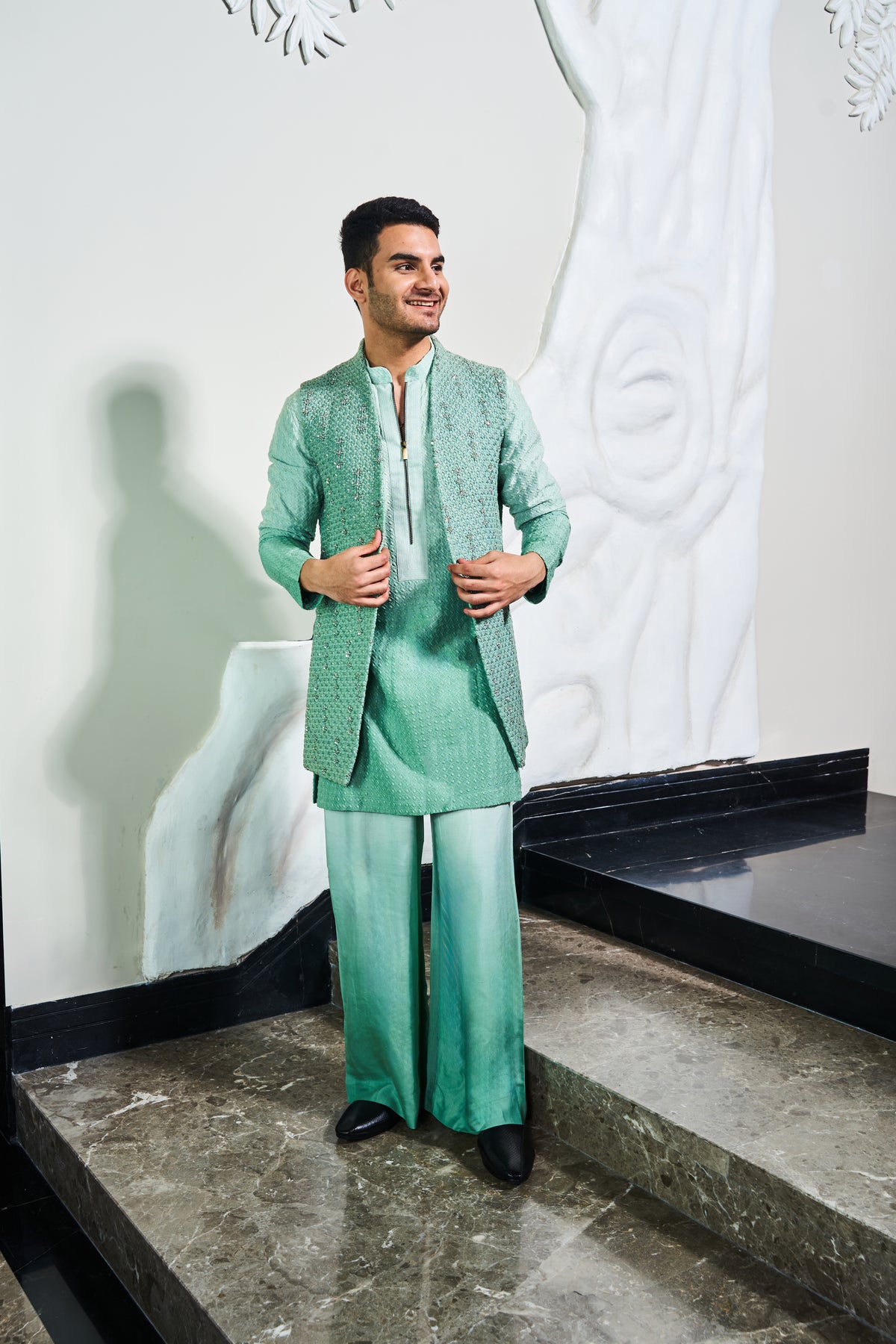 This green colored open long jodhpuri